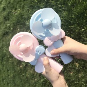 Lollipop-shaped hand-held push-on fan