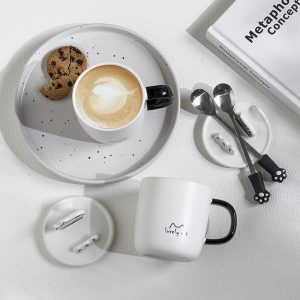 Multifunctional ceramic mug with spoon